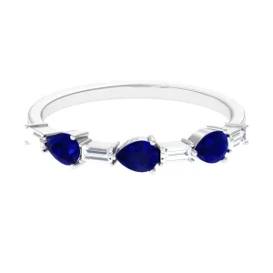 Blue Sapphire and Diamond East West Half Eternity Ring