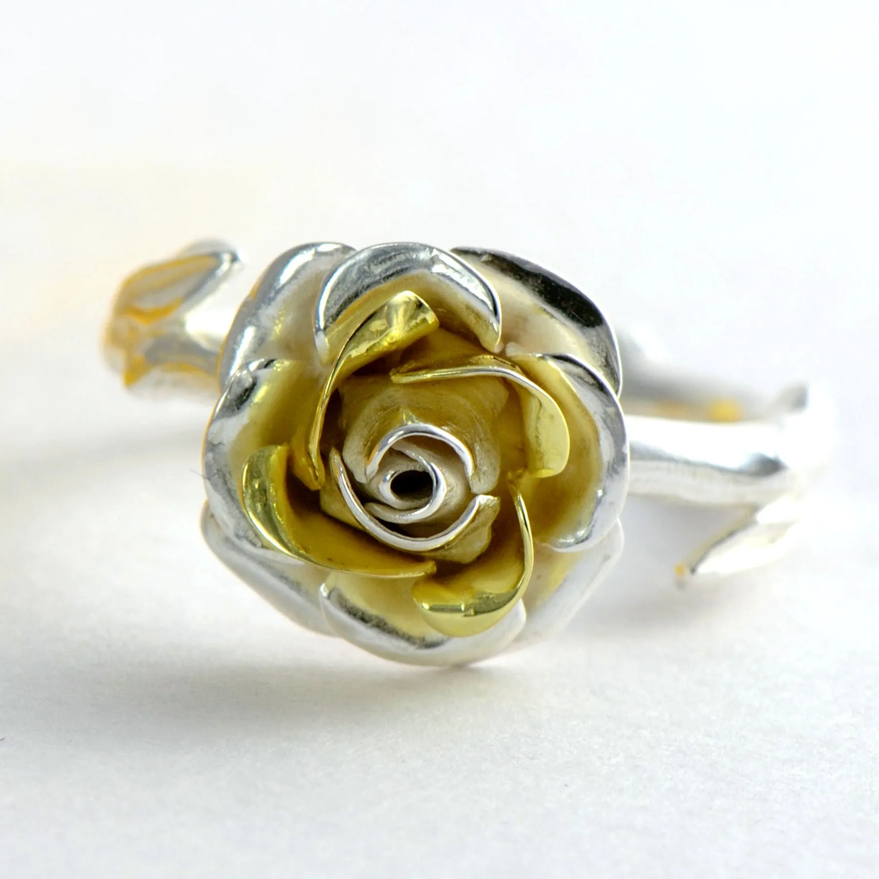 Large cocktail rose ring with a soft rose stem made in sterling silver