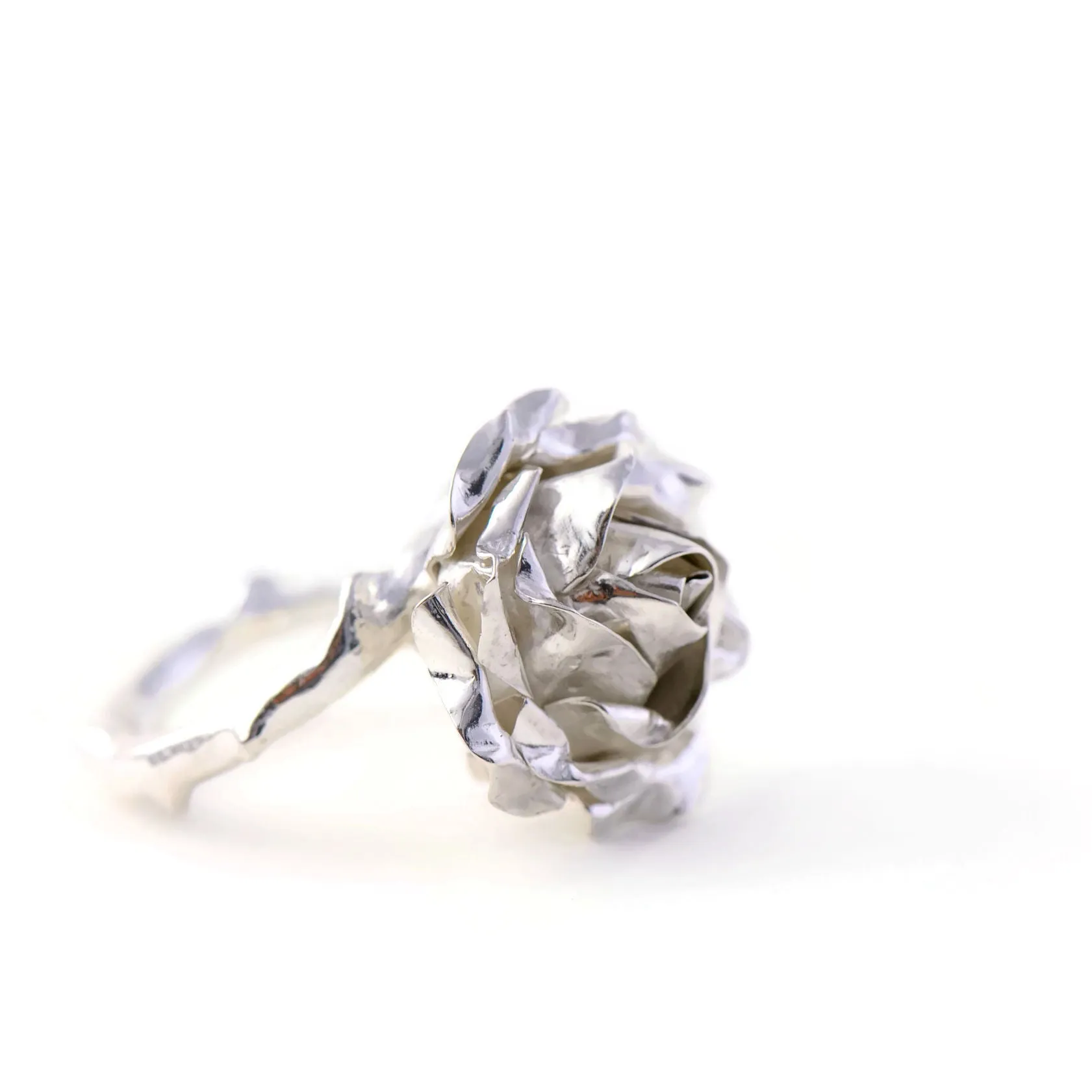 Large cocktail rose ring with a soft rose stem made in sterling silver