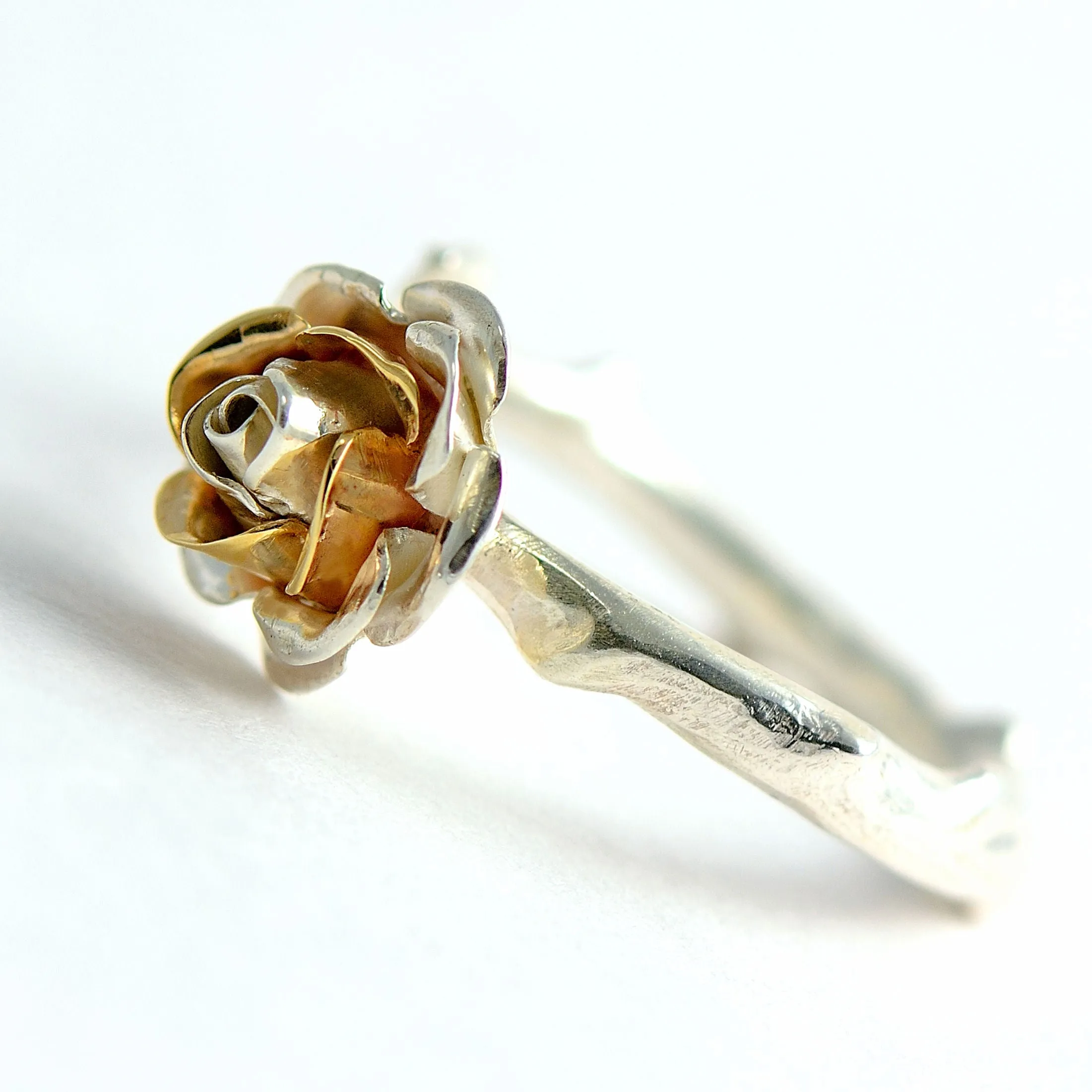 Large cocktail rose ring with a soft rose stem made in sterling silver